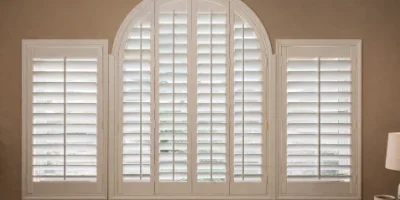 Bedroom With Wood Shutters
